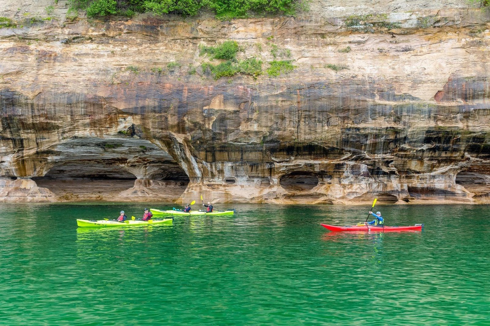 If it wasn’t for the cool clear water of Lake Superior, the turquoise color of the water might trick visitors into thinking it’s the Caribbean. PC: Pictured Rocks Kayaking.